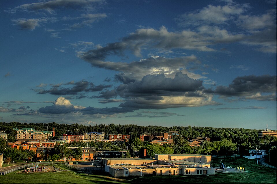 Downtown St. Albert, trees and clouds in 2010.